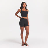 COTTON RIB TANK | SOOT ON A MODEL SIDE VIEW @ | FOCUS: 0.0, 1.0, 0.9