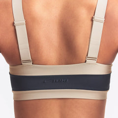 NikeSKIMS MATTE AND SHINE STRAIGHT NECK BRA | DEEP ROYAL/STONE ON A MODEL SIDE VIEW @ | FOCUS: 0.0, 1.0, 0.9