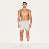 SKIMS COTTON MENS KNIT BOXER 3-PACK | HEATHER MULTI ON A MODEL FRONT VIEW | FOCUS: 0.0, 1.0, 0.9
