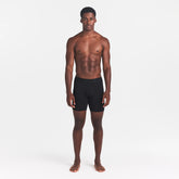 SKIMS STRETCH MENS 5" BOXER BRIEF | OBSIDIAN ON A MODEL FRONT VIEW @ | FOCUS: 0.0, 1.0, 0.9