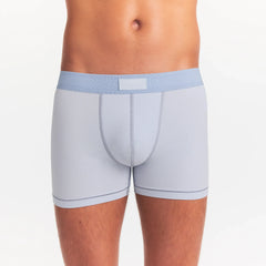 SKIMS COTTON MENS 3" BOXER BRIEF 3-PACK | NIMBUS MULTI ON A MODEL FRONT VIEW