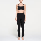 OUTDOOR HIGH-WAISTED LEGGING | ONYX ON A MODEL FRONT VIEW