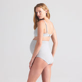 COTTON JERSEY MATERNITY HIGH-WAISTED BRIEF | LIGHT HEATHER GREY ON A MODEL SIDE VIEW | FOCUS: 0.0, 1.0, 0.9