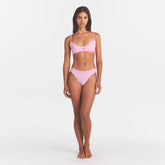 FITS EVERYBODY LACE SCOOP BRALETTE | BUBBLE GUM TONAL ON A MODEL FRONT VIEW @ | FOCUS: 0.0, 1.0, 0.9