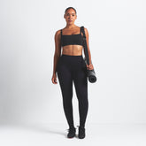 NikeSKIMS VINTAGE SEAMLESS CAMI BRA | OBSIDIAN ON A MODEL FRONT VIEW @ | FOCUS: 0.9, 0.1, 0.7