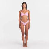 FITS EVERYBODY LACE TRIANGLE BRALETTE | BUBBLEGUM TONAL ON A MODEL FRONT VIEW