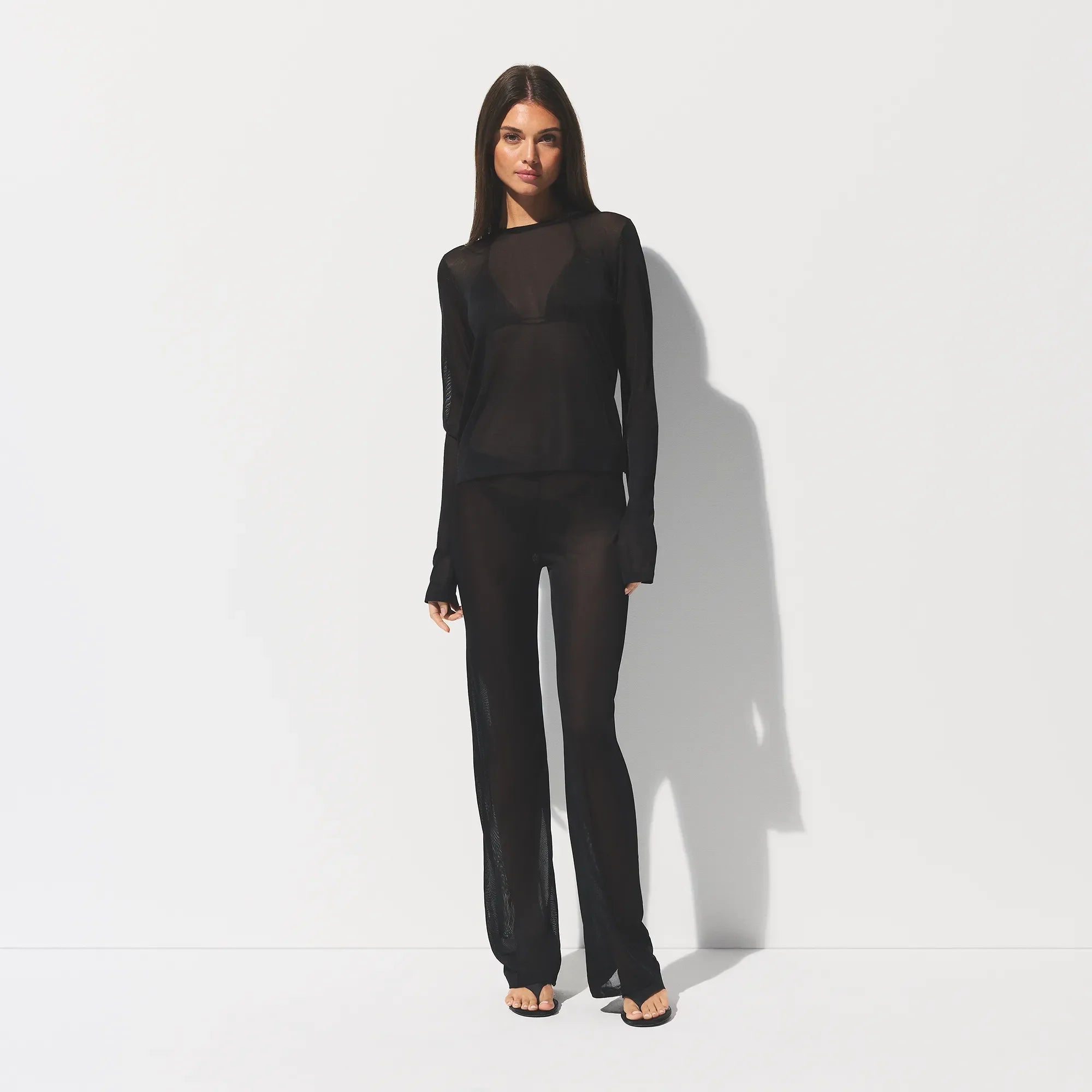 SLINKY KNIT LOW RISE PANT | OBSIDIAN ON A MODEL FRONT VIEW @ | FOCUS: 0.0, 1.0, 0.9