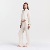 DRAPEY FRENCH TERRY STRAIGHT LEG PANT | BUFF ON A MODEL SIDE VIEW @ | FOCUS: 0.0, 1.0, 0.9
