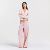 COTTON POPLIN PANT | DUSTY PINK ON A MODEL FRONT VIEW @ | FOCUS: 0.0, 1.0, 0.9