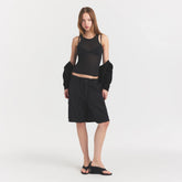 WOVEN COTTON OVERSIZED CARGO SHORT | ONYX ON A MODEL FRONT VIEW @ | FOCUS: 0.0, 1.0, 0.9