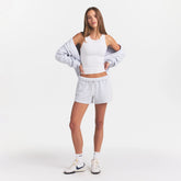 COTTON FLEECE CLASSIC SHORT | LIGHT HEATHER GREY ON A MODEL FRONT VIEW @ | FOCUS: 0.0, 1.0, 0.9