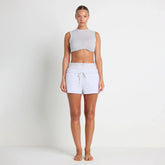 COTTON FLEECE DOUBLE WAISTBAND SHORT | LIGHT HEATHER GREY ON A MODEL FRONT VIEW@| FOCUS: 0.0, 1.0, 0.9