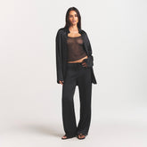 LIGHTWEIGHT SATIN STRAIGHT LEG PANT | OBSIDIAN ON A MODEL FRONT VIEW @ | FOCUS: 0.0, 1.0, 0.9