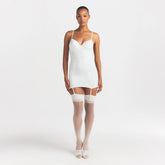 LACE SHAPEWEAR MINI SLIP DRESS | IVORY ON A MODEL FRONT VIEW @
