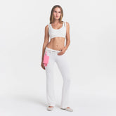 NikeSKIMS AIRY LOW RISE MINI FLARE PANT | IVORY ON A MODEL
