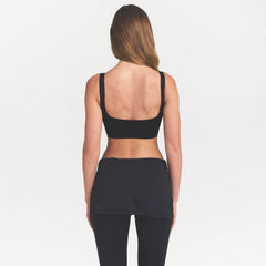 NikeSKIMS MATTE CORSET LONGLINE BRA | OBSIDIAN ON A MODEL