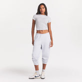 COTTON FLEECE CLASSIC JOGGER | LIGHT HEATHER GREY ON A MODEL FRONT VIEW @ | FOCUS: 0.0, 1.0, 0.9