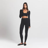 WOOL RIB LONG SLEEVE SUPER CROPPED TOP | OBSIDIAN ON A MODEL FRONT VIEW S | FOCUS: 0.0, 1.0, 0.9