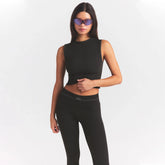 NikeSKIMS RIBBED SEAMLESS MUSCLE TANK | OBSIDIAN ON A MODEL SIDE VIEW @ | FOCUS: 0.0, 1.0, 0.9