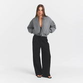 NEOPRENE OUTERWEAR REVERSIBLE BOMBER JACKET | DARK HEATHER GREY ON A MODEL FRONTVIEW @ | FOCUS: 0.0, 1.0, 0.9