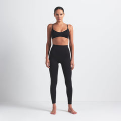 NikeSKIMS MATTE KNEE GRIP 26" LEGGING | OBSIDIAN ON A MODEL FRONT VIEW @ | FOCUS: 0.0, 1.0, 0.9