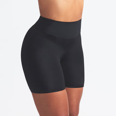 NikeSKIMS SHINE BONDED WAIST 5" BIKER SHORT | OBSIDIAN ON A MODEL SIDE VIEW