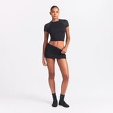 NikeSKIMS AIRY FOLDOVER SKORT | OBSIDIAN ON A MODEL FRONT VIEW @ | FOCUS: 0.0, 1.0, 0.9
