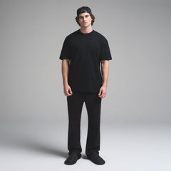 HEAVYWEIGHT COTTON MENS RELAXED T-SHIRT | OBSIDIAN ON A MODEL FRONT VIEW | FOCUS: 0.0, 1.0, 0.9