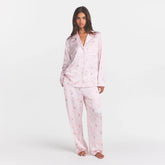WOVEN SHINE LONG SLEEP SET | BARELY PINK SNACK BAG ON A MODEL FRONT VIEW @ | FOCUS: 0.0, 1.0, 0.9