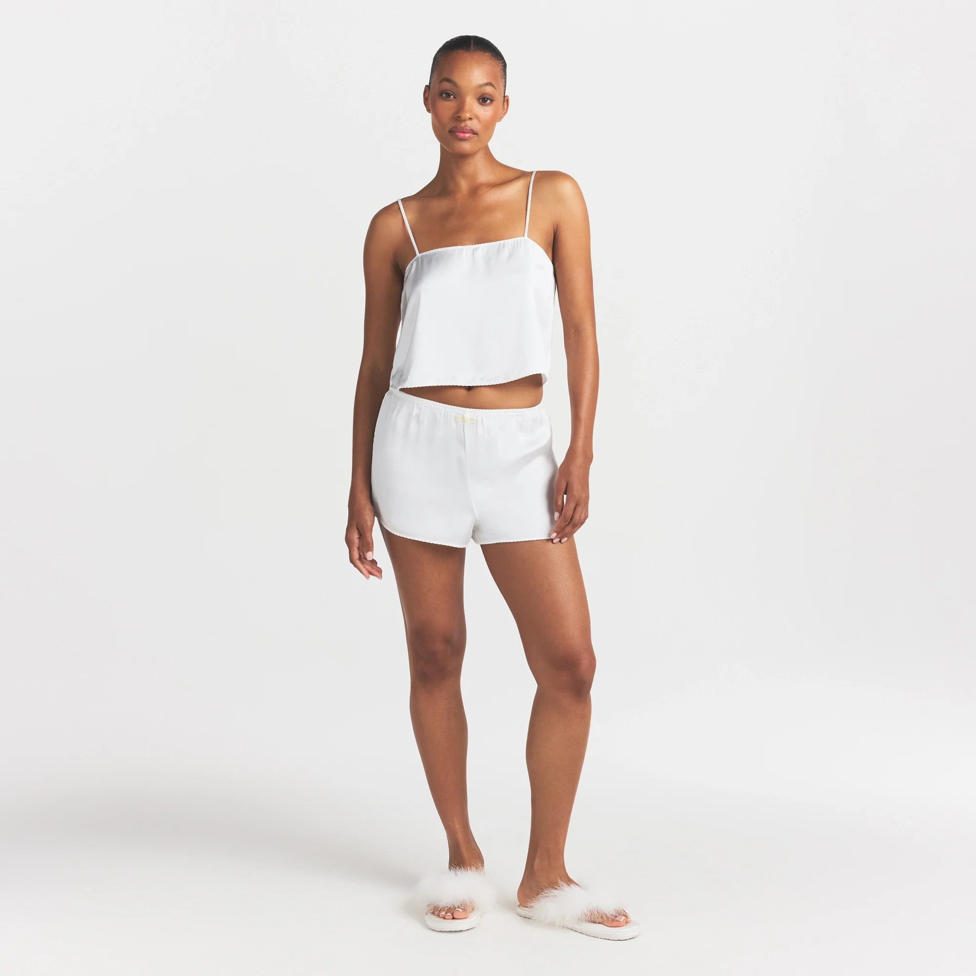 WOVEN SHINE CAMI AND SHORT SLEEP SET | IVORY ON A MODEL FRONT VIEW @ | FOCUS: 0.0, 1.0, 0.9