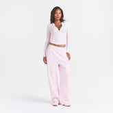 COTTON RIB ZIP UP TOP | CHERRY BLOSSOM ON A MODEL FRONT VIEW @ | FOCUS: 0.0, 1.0, 0.9