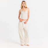 RIB KNIT LACE CAMI | EGRET ON A MODEL FRONT VIEW @ | FOCUS: 0.0, 1.0, 0.9