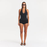 SMOOTH LAYERS HALTER TOP | OBSIDIAN ON A MODEL FRONT VIEW @ | FOCUS: 0.0, 1.0, 0.9