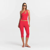 SMOOTH LAYERS ASYMMETRICAL TANK | CARMINE ON A MODEL FRONT VIEW @ | FOCUS: 0.0, 1.0, 0.9