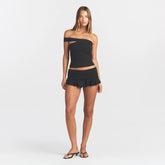 COTTON JERSEY ASYMMETRICAL TUBE TOP | SOOT ON A MODEL FRONT VIEW @ | FOCUS: 0.0, 1.0, 0.9