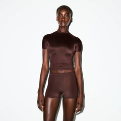 NikeSKIMS SHINE SHORT SLEEVE MOCK NECK TOP | PHOENIX ON A MODEL SIDE VIEW @ | FOCUS: 0.0, 1.0, 0.9