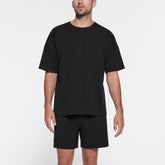 JERSEY LOUNGE MENS RELAXED T-SHIRT | OBSIDIAN ON A MODEL FRONT VIEW