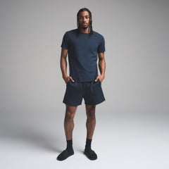 SKIMS COTTON MENS CLASSIC T-SHIRT | NAVY ON A MODEL FRONT VIEW | FOCUS: 0.0, 1.0, 0.9