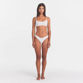 LIGHTWEIGHT COTTON THONG 10-PACK | MICRO DOT FLORAL MULTI ON A MODEL FRONT VIEW @ | FOCUS: 0.0, 1.0, 0.9