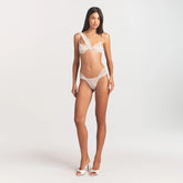 ULTRA FINE MESH DRAPED THONG | IVORY ON A MODEL FRONT VIEW @ | FOCUS: 0.0, 1.0, 0.9