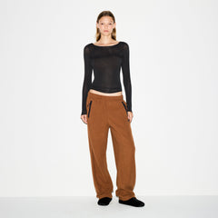 OUTDOOR FLEECE STRAIGHT LEG PANT | CHAI ON A MODEL FRONT VIEW @ | FOCUS: 0.0, 1.0, 0.9