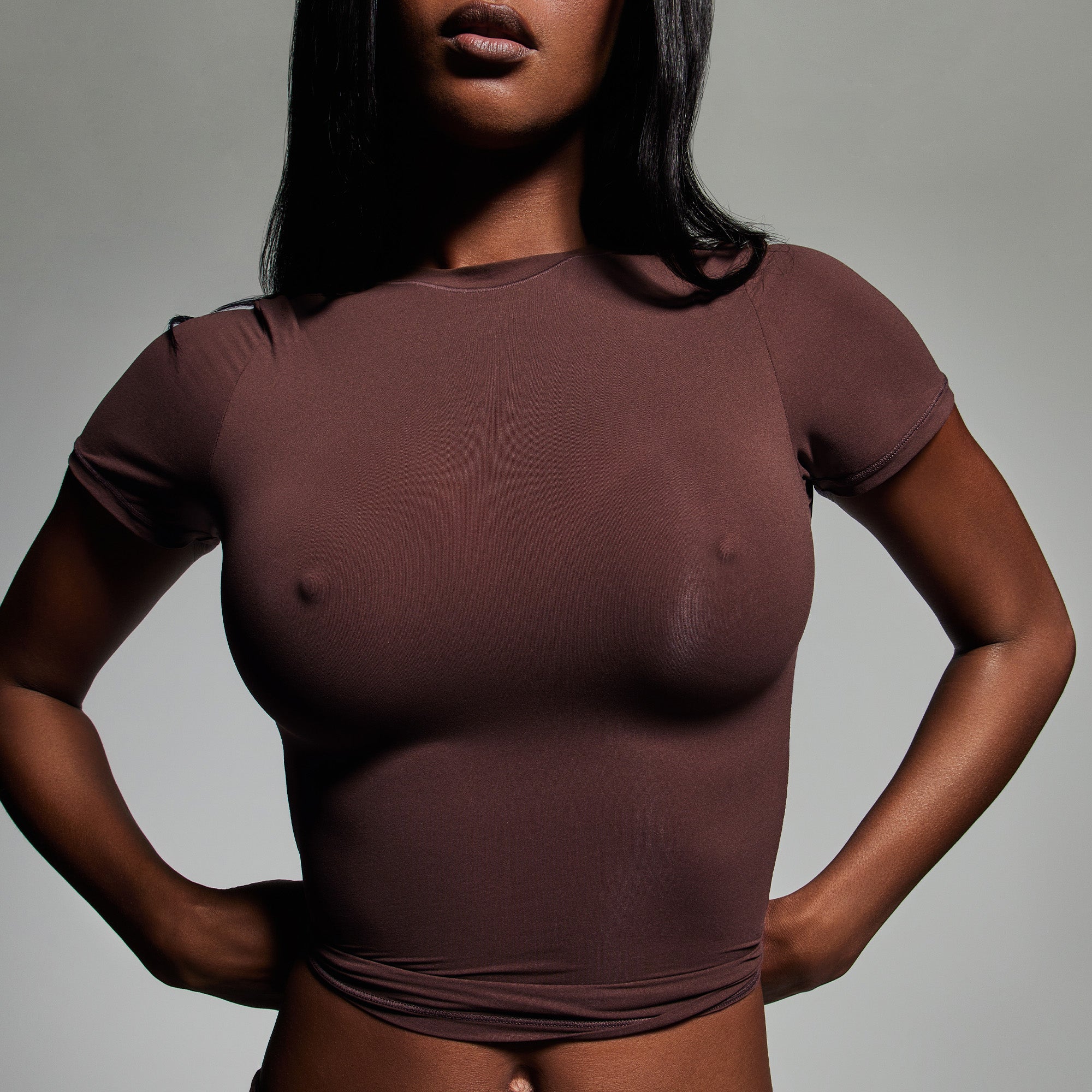 SKIMS ULTIMATE NIPPLE PUSH-UP BRA WORN BY A MODEL IN CAMPAIGN IMAGERY | FOCUS: 0.0, 1.0, 0.9