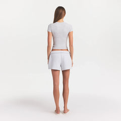 COTTON JERSEY T-SHIRT | LIGHT HEATHER GREY ON A MODEL BACK VIEW @ | FOCUS: 0.0, 1.0, 0.9
