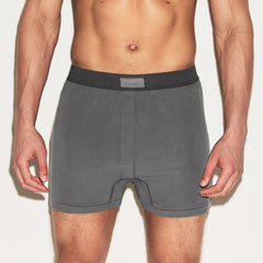 SKIMS COTTON MENS KNIT BOXER 3-PACK | HEATHER MULTI ON A MODEL SIDE VIEW | FOCUS: 0.0, 1.0, 0.9