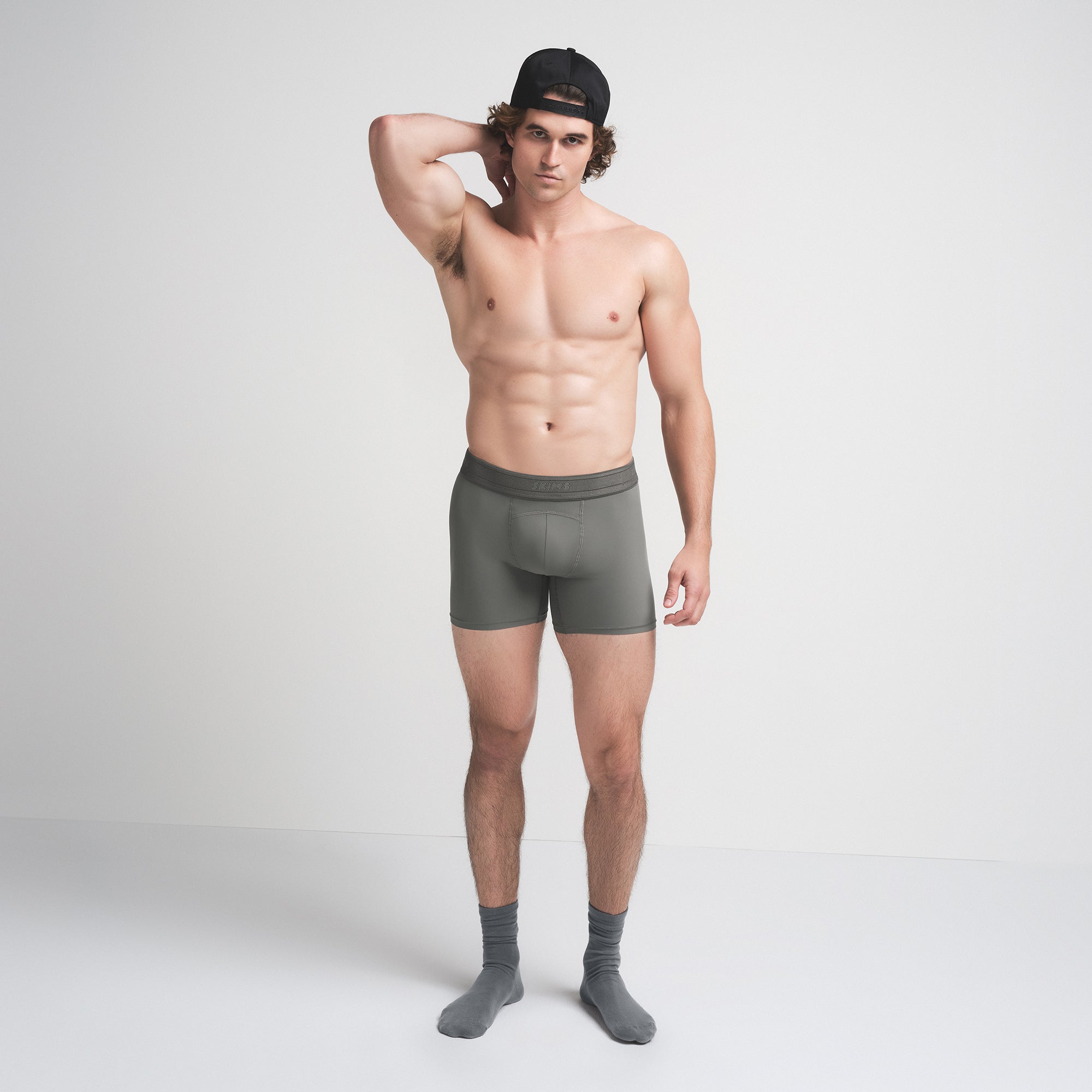 SKIMS SPORT MENS 5" BOXER BRIEF | GUNMETAL ON A MODEL FRONT VIEW | FOCUS: 0.0, 1.0, 0.9