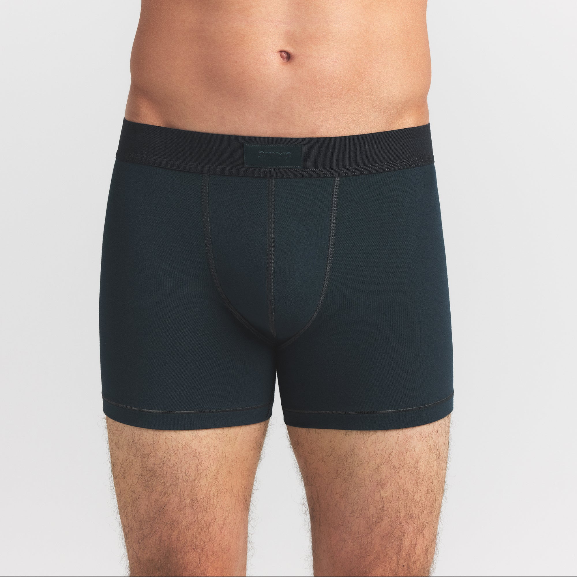 SKIMS COTTON MENS 3" BOXER BRIEF 5-PACK | VERDANT SKY MULTI ON A MODEL FRONT VIEW @ | FOCUS: 0.0, 1.0, 0.9