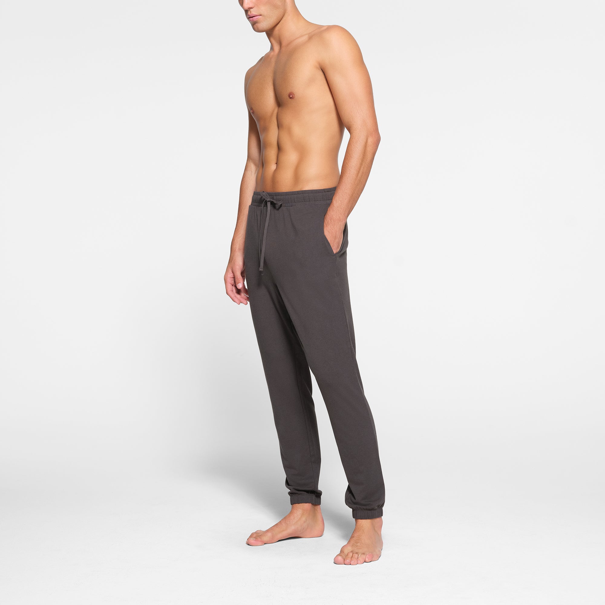 LOUNGE JERSEY MENS JOGGER | ASH ON A MODEL SIDE VIEW @ | FOCUS: 0.9, 0.1, 0.7