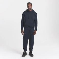 FLEECE LOUNGE MENS TAPERED JOGGER | NAVY ON A MODEL FRONT VIEW @ | FOCUS: 0.0, 1.0, 0.9
