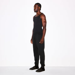 FLEECE LOUNGE MENS TAPERED JOGGER | WASHED ONYX ON A MODEL FRONT VIEW @ | FOCUS: 0.0, 1.0, 0.9
