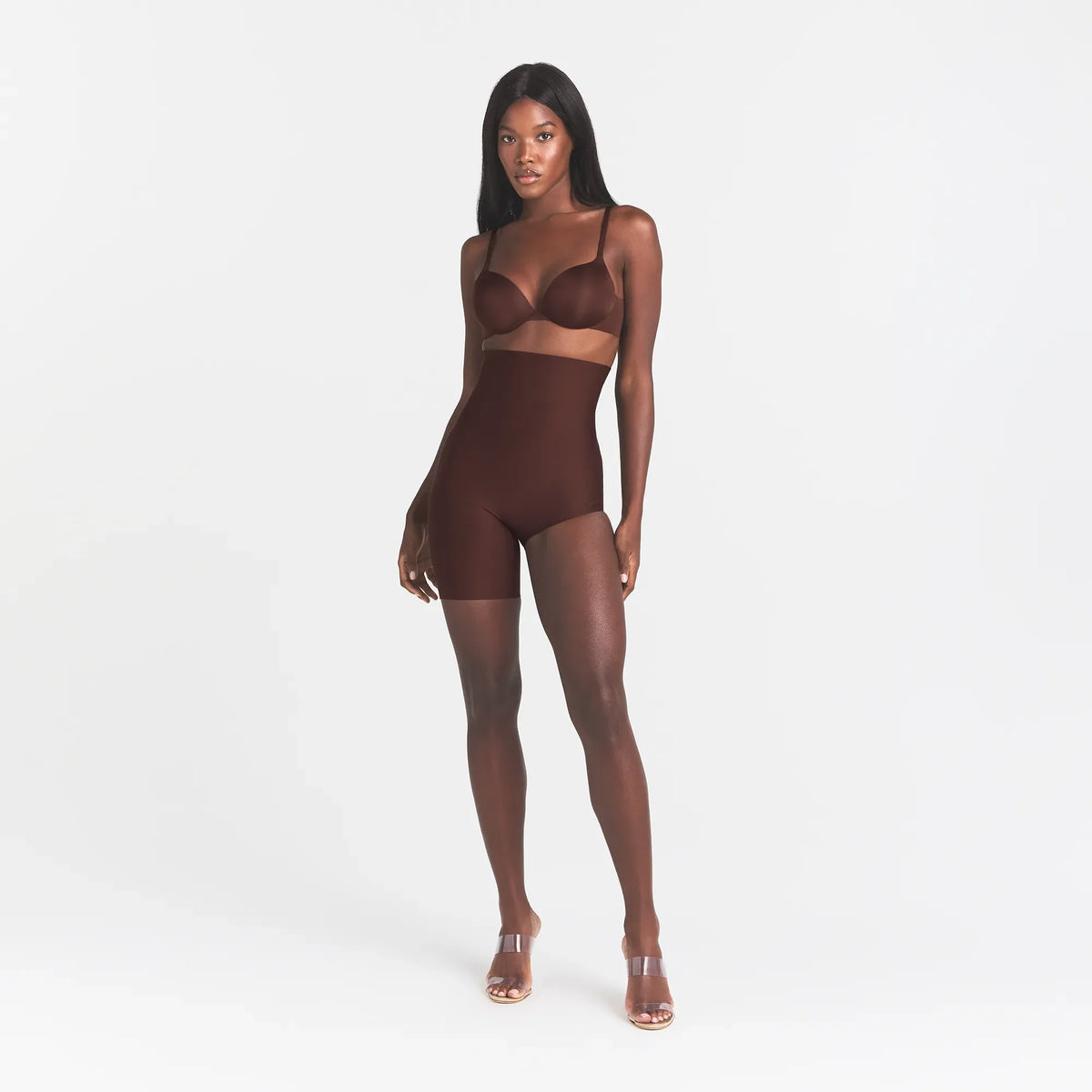 SKIMS BODY LEFT LEG SOLUTION SHORT | COCOA ON A MODEL FRONT VIEW @